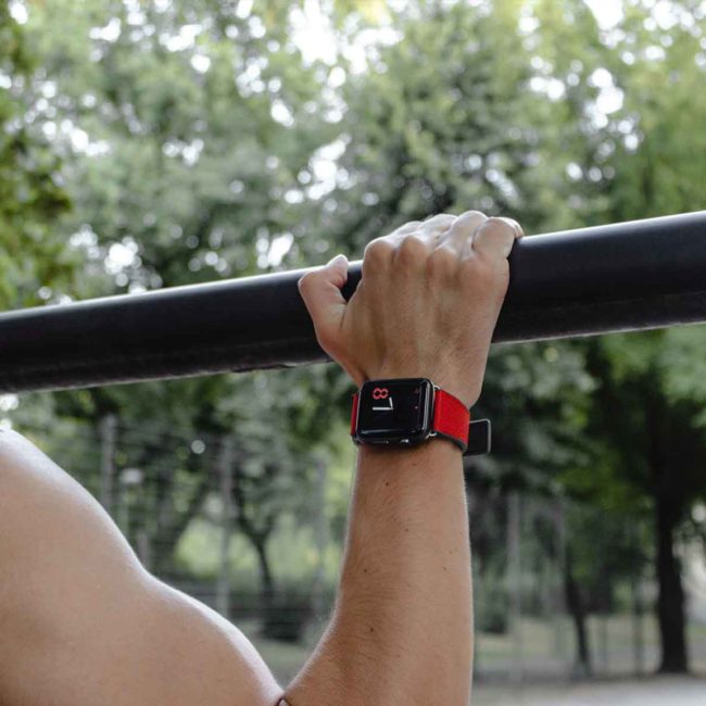 Lobster-Apple-watch-red-natural-rubber-band-on-training-workout-bs