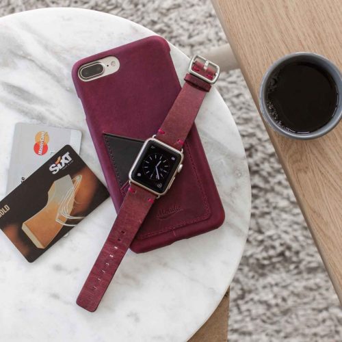 Grapevine-Iphone-leather-case-and-an-Apple-watch-red-band-on-top-bs