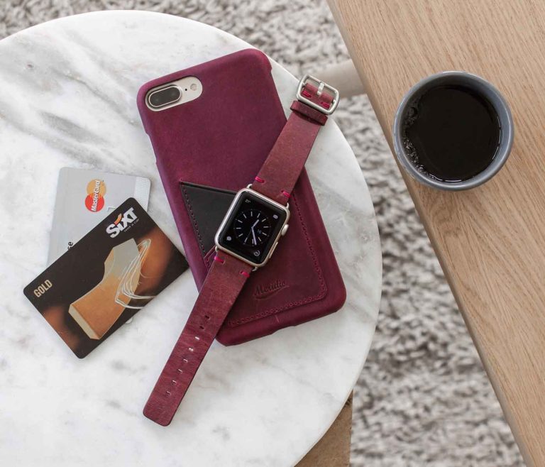 Grapevine-Iphone-leather-case-and-an-Apple-watch-red-band-on-top-bs