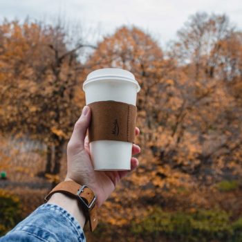 Reindeer-and-a-light-brown-cup-leather-sleeves-in-the-air-winter-mood