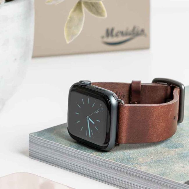 Burnt-Apple-watch-brown-band-on-top-of-magazine