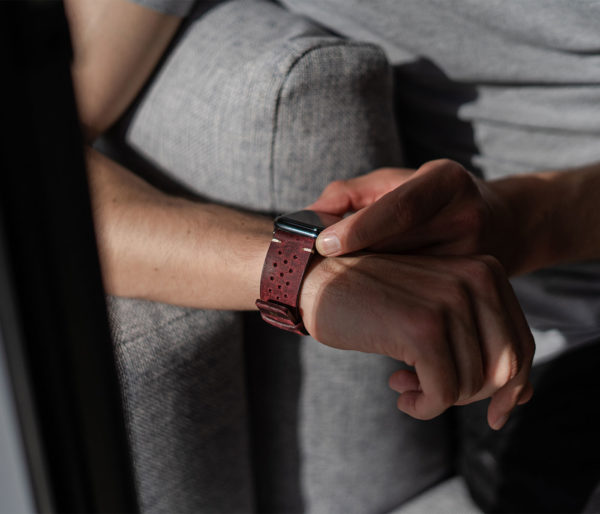 AW-bullet-proof-red-leather-band-in-a-sunny-day-for-him
