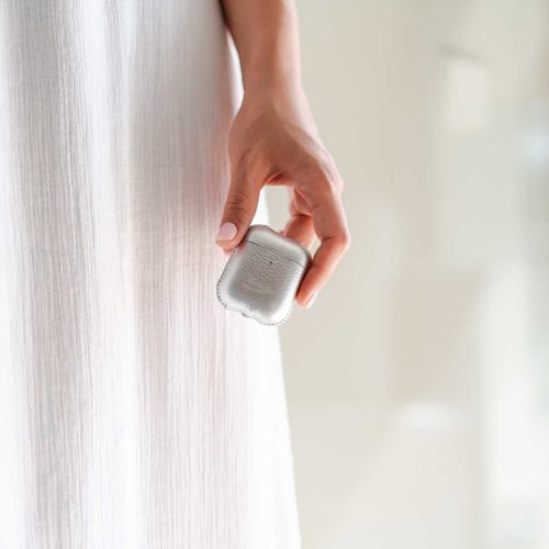 Crystal-Airpods-silver-leather-case-with-a-long-white-dress-as-background-bs