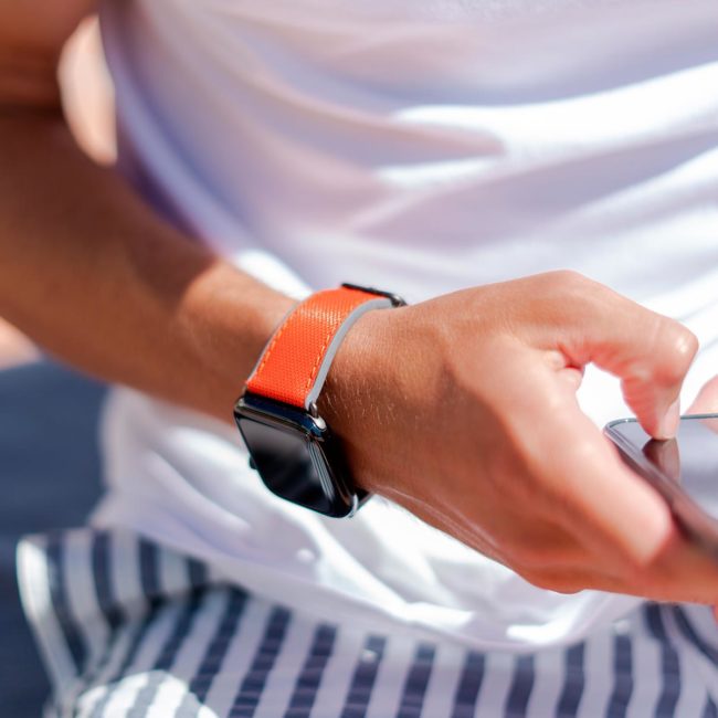 Lobster-Apple-watch-red-orange-rubber-band-texting-a-message-with-own-iphone