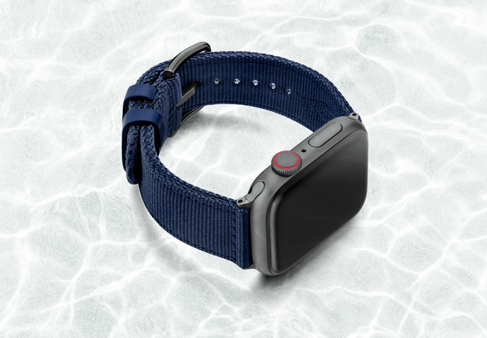 AW-blue-tide-recycled-by-ocean-band-44mm-case-on-right-with-space-grey-adaptors