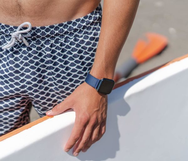 Apple-watch-blue-tide-band-recicled-ocean-plastic-man-in-surf
