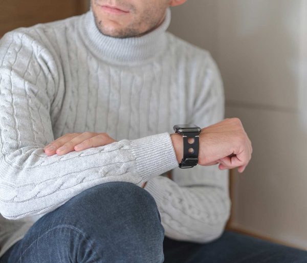 AW black full grain leather band for man wearing a white shirt